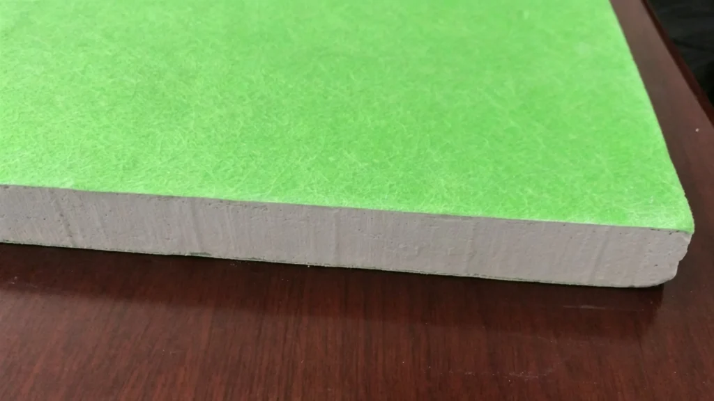 Green fiberglass surface mat gypsum board