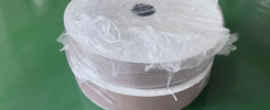 Packaged fiberglass paper rolls for desiccant rotor production