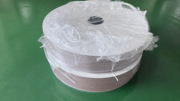 Packaged fiberglass paper rolls for desiccant rotor production